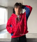 Close-up of Spidey Hoodie material and The Drip Soul logo – soft premium fabric with stitched web detailing.