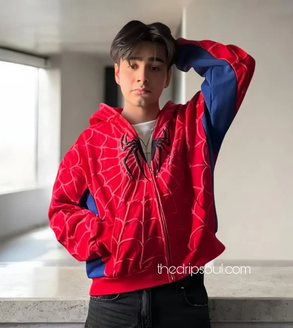 Close-up of Spidey Hoodie material and The Drip Soul logo – soft premium fabric with stitched web detailing.