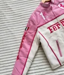 Close-up of premium pink leather and zipper details on Ferrari F1 Limited Edition Racing Jacket