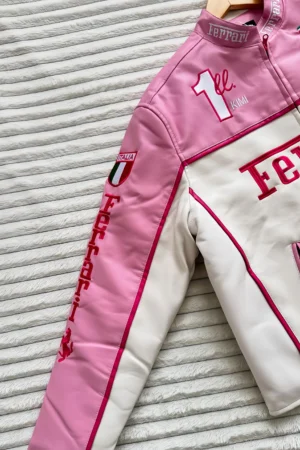 Close-up of premium pink leather and zipper details on Ferrari F1 Limited Edition Racing Jacket