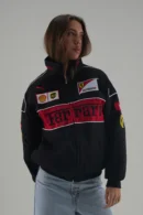 Close-up of Ferrari F1 Motorsport Racing Legend Black and Red Racer Jacket with Shell and UPS sponsor logos