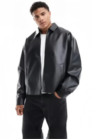 THE DRIP SOUL Men's Oversized Black Faux Leather Jacket, full front view with zip closure and collared neckline.