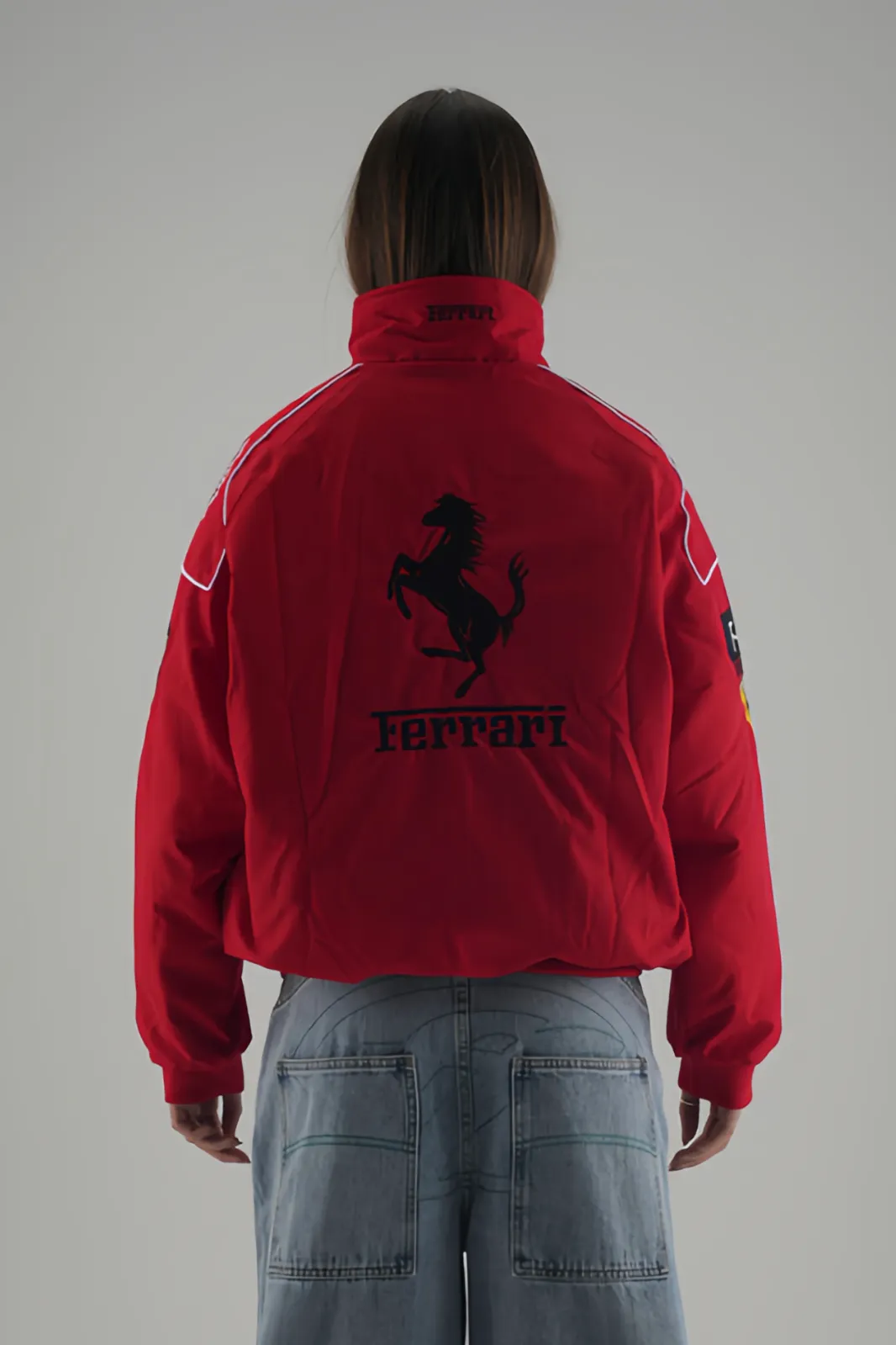 Back view of the Red & Black Racing Jacket featuring the iconic Ferrari F1 logo.