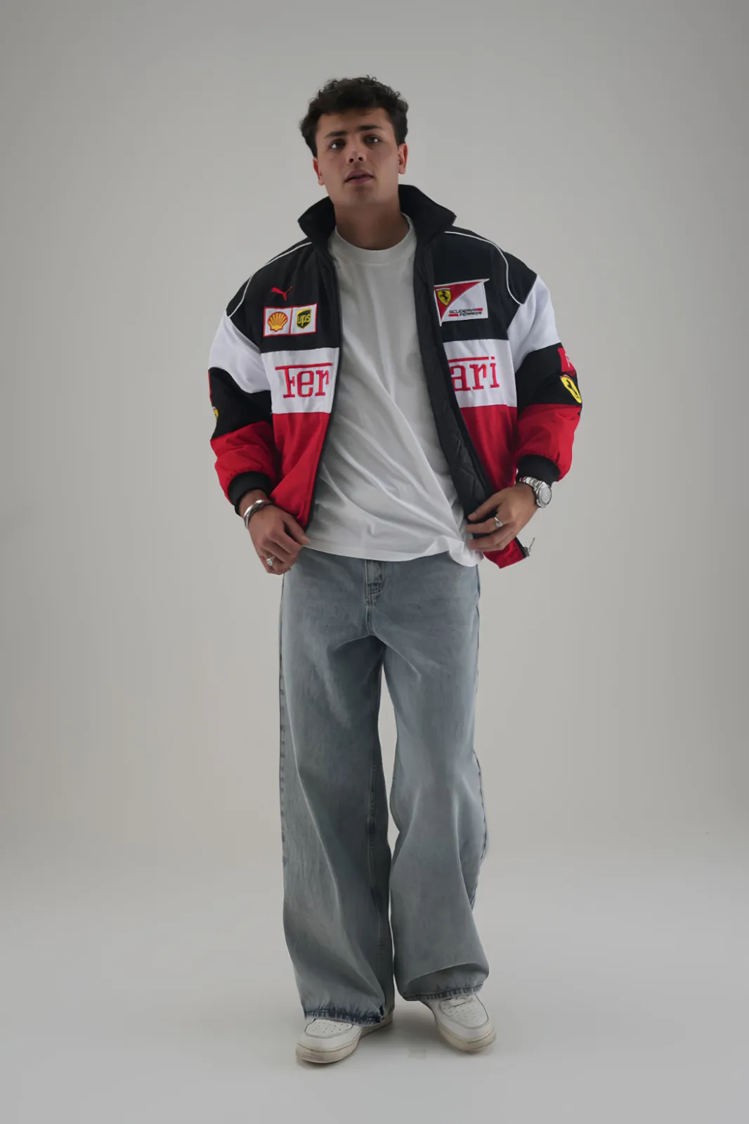 Model wearing oversized Ferrari F1 Racer Jacket and wide-leg denim