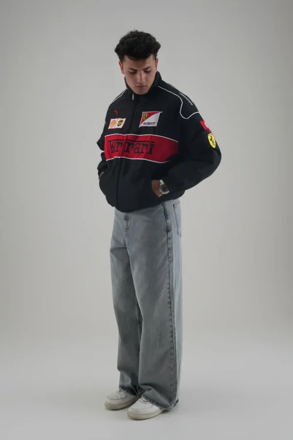 Model wearing Ferrari F1 Vintage Racing Jacket with hands in pockets