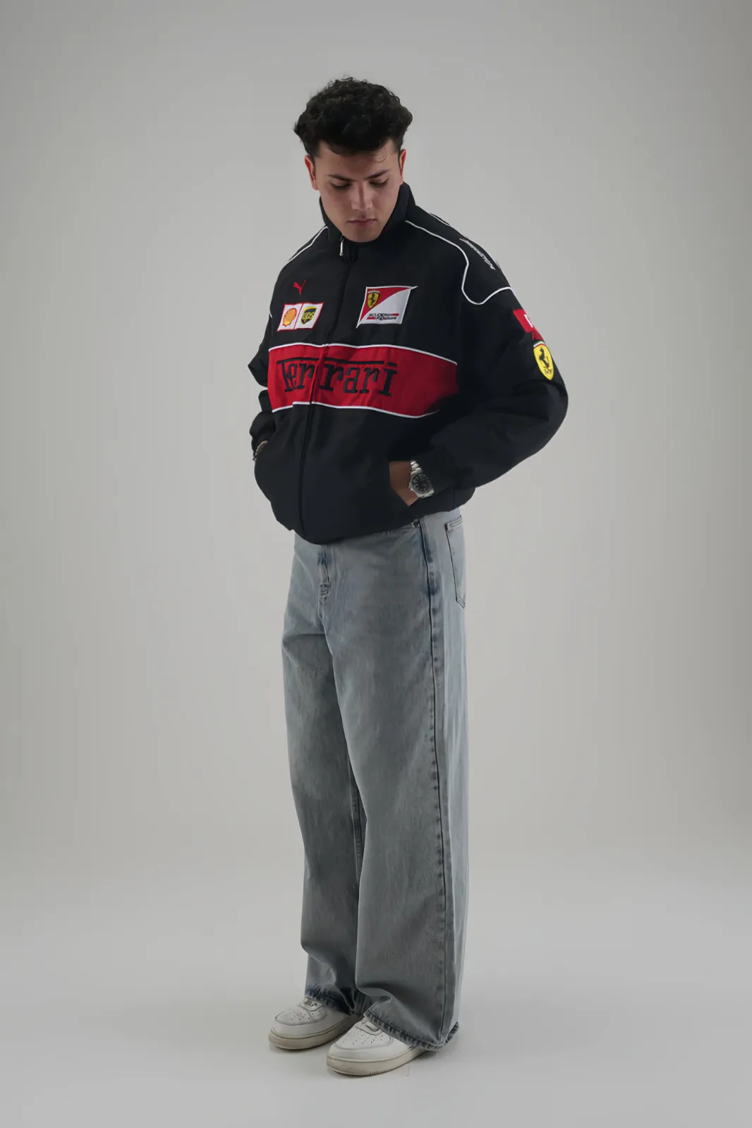 Model wearing Ferrari F1 Vintage Racing Jacket with hands in pockets