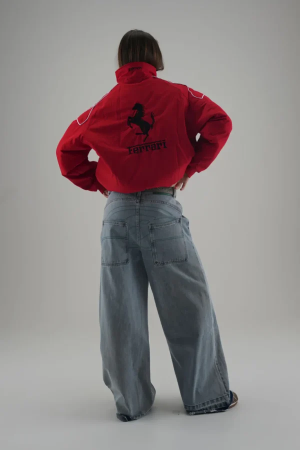 Back close-up of the Red & Black Racing Jacket with large Ferrari horse emblem.