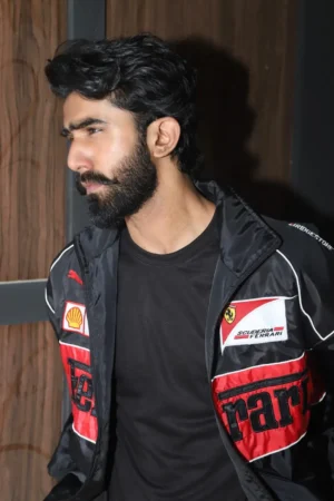 Close-up fabric texture of embroidered Ferrari jacket