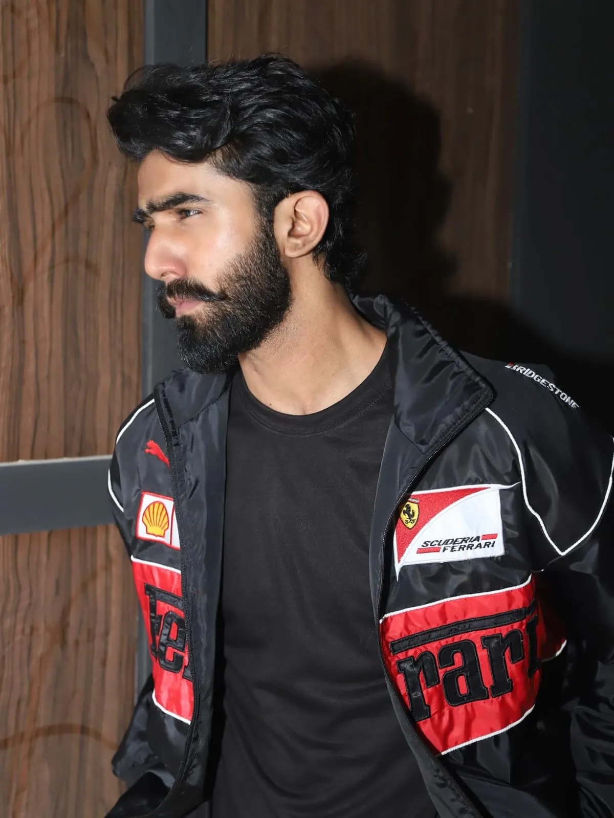 Close-up fabric texture of embroidered Ferrari jacket