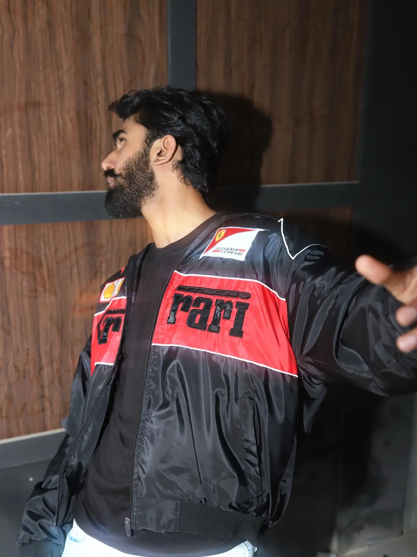Left side profile of black Ferrari embroidered jacket