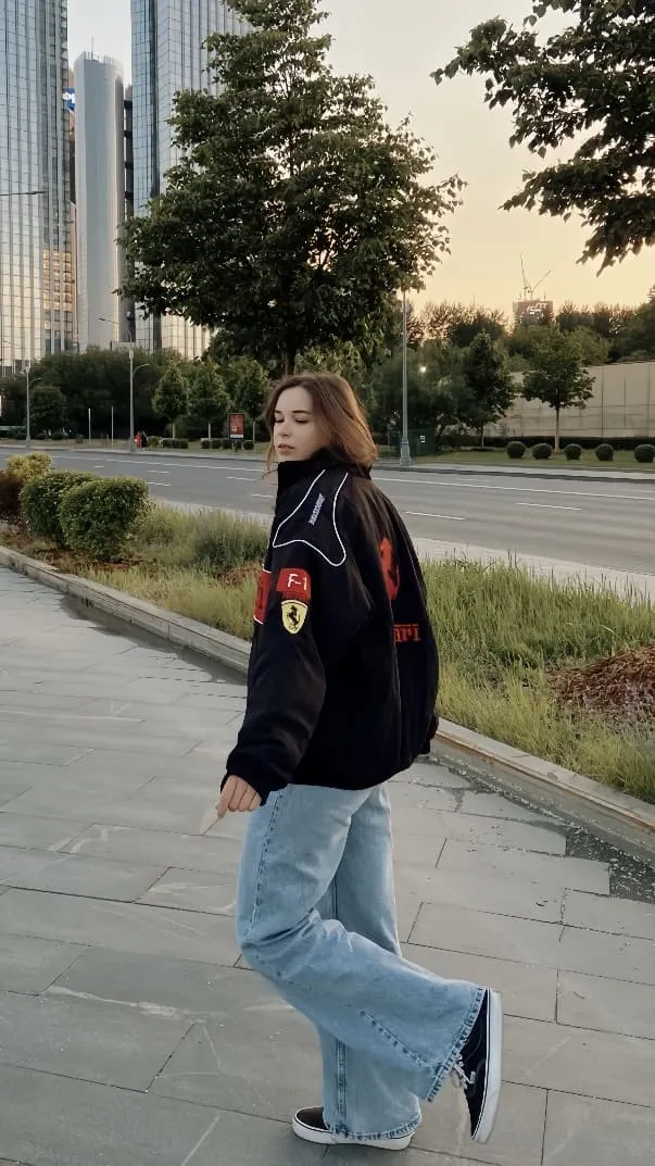 Black Ferrari F1 jacket left side profile view