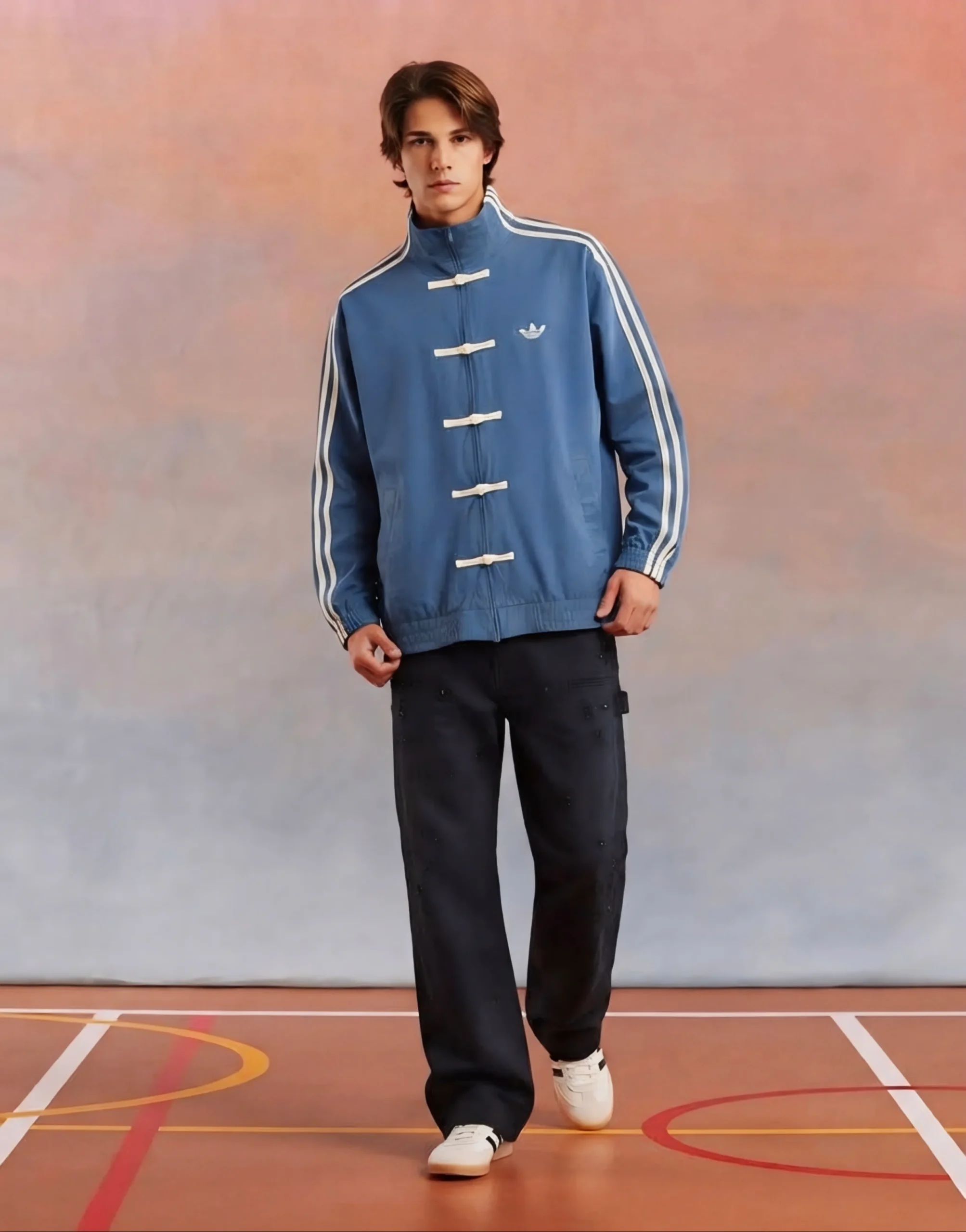 Model wear and Showing full front view of Adidas CNY Jacket in Blue Color by The Drip Soul with Chinese New Year knot detailing