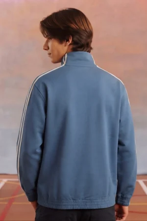 CNY Jacket by The Drip Soul in India Model Wear Blue Color and Showing back view of oversized streetwear silhouette Adidas Knot Jacket